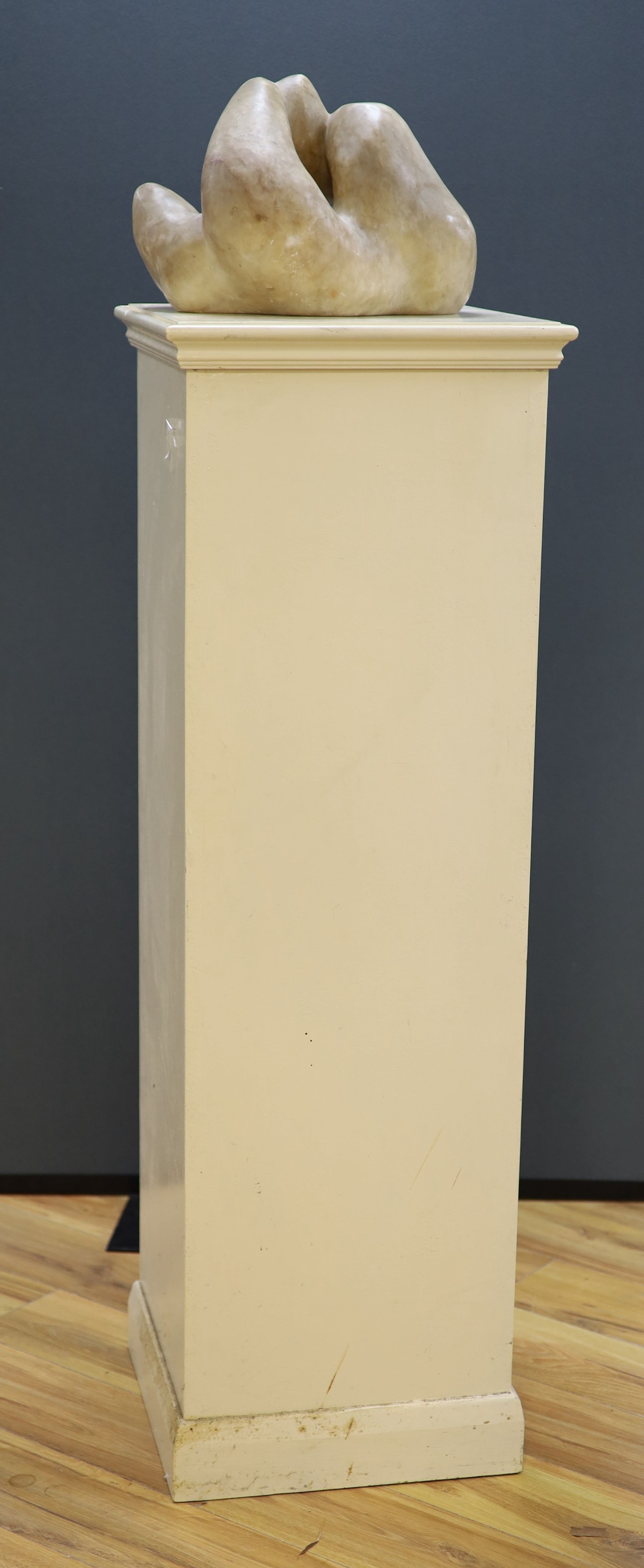 Wilby Hart, alabaster sculpture, abstract form, W. 33cm. H 32cm., on a painted wood pedestal.